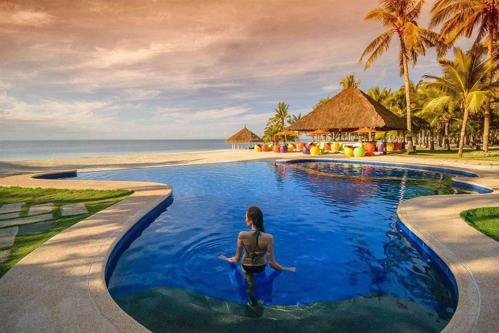 Oceanica Resort Panglao, Bohol Exterior photo Infinity pool at the beach