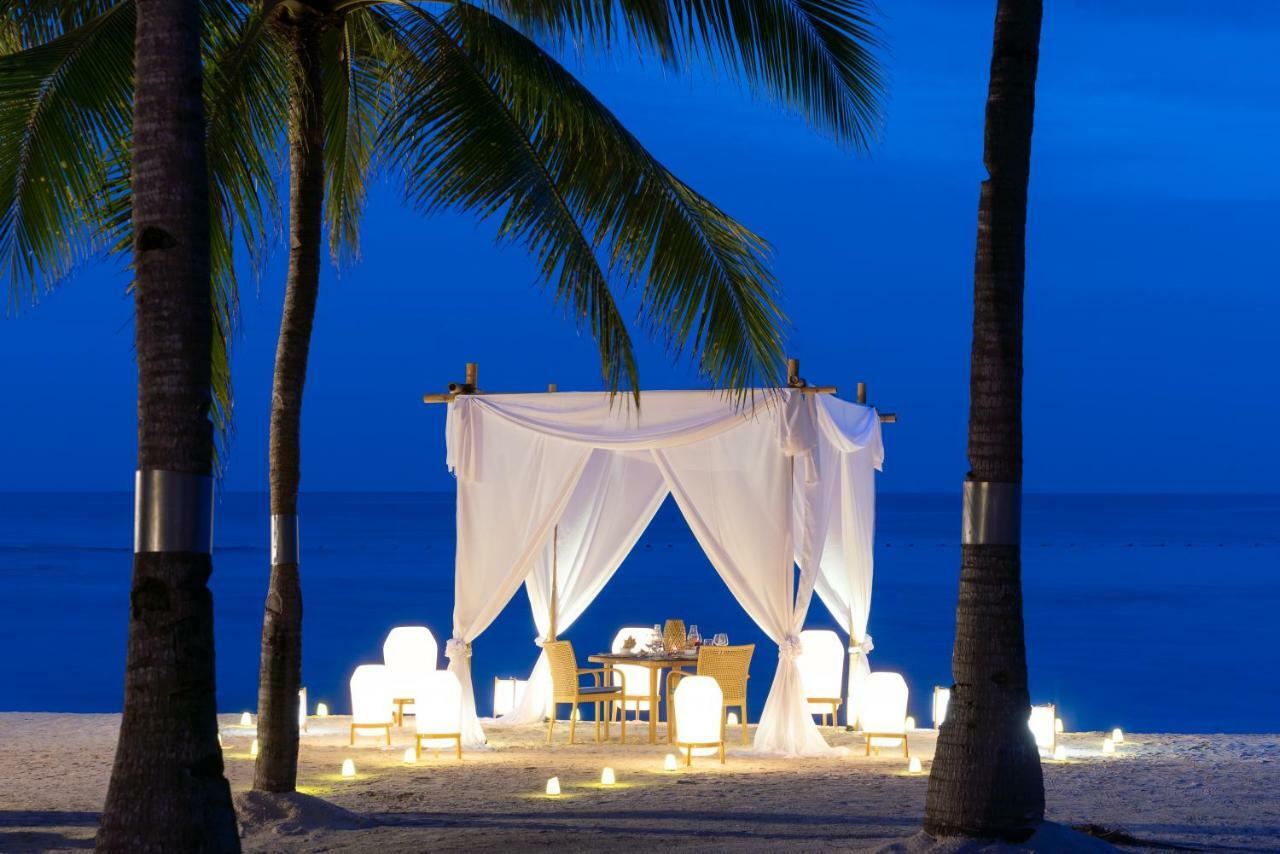 Oceanica Resort Panglao, Bohol Exterior photo A beachside dining experience at the resort