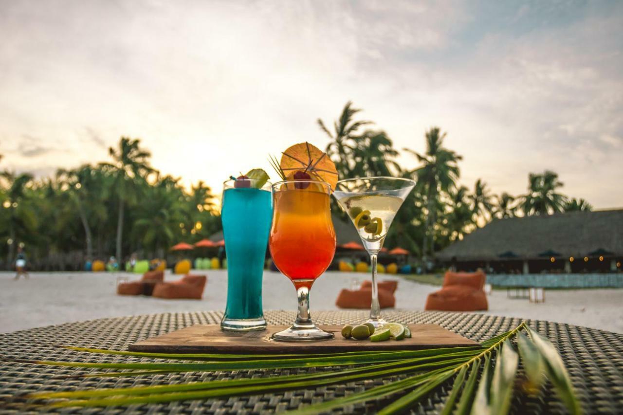 Oceanica Resort Panglao, Bohol Exterior photo Cocktails at a beach resort