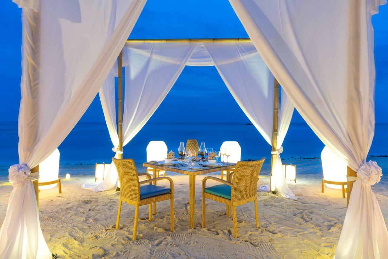 Oceanica Resort Panglao, Bohol Exterior photo A beachside dining experience at the resort