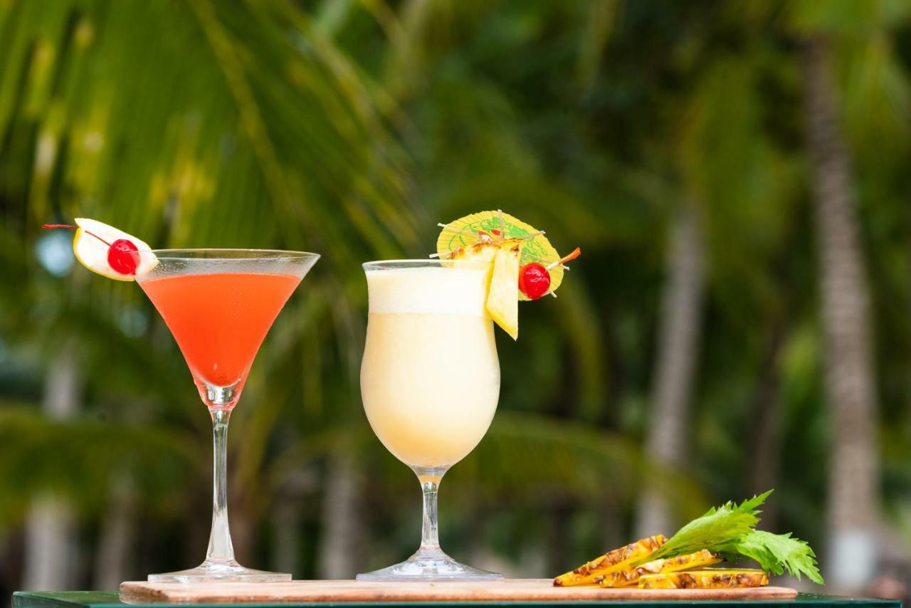 Oceanica Resort Panglao, Bohol Exterior photo Two tropical drinks