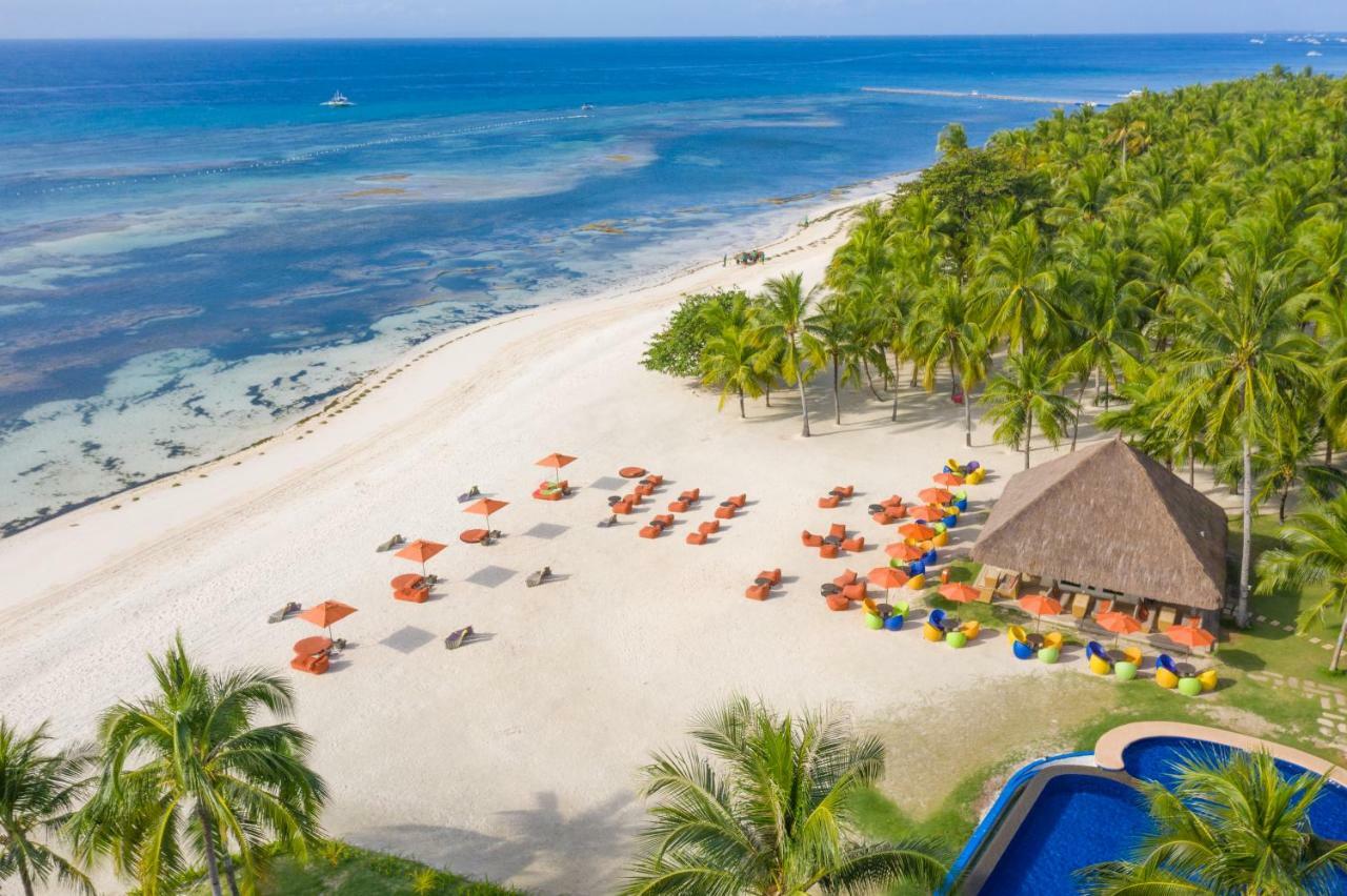 Oceanica Resort Panglao, Bohol Exterior photo Aerial view of the beach at the resort