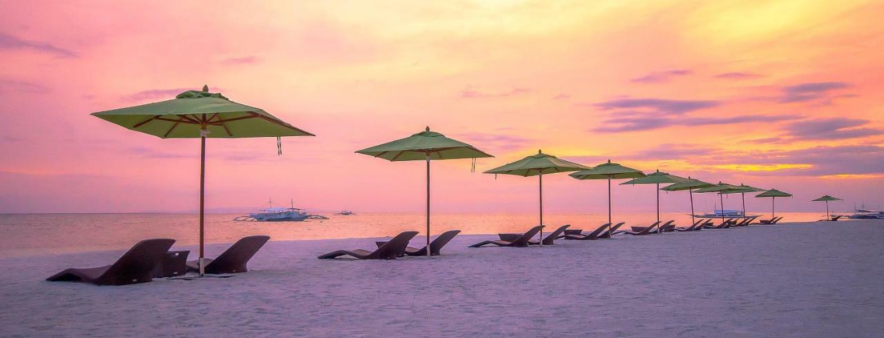 Oceanica Resort Panglao, Bohol Exterior photo Sunset at the beach